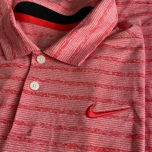 Nike Dri Fit Polo. Looks brand new. great for golf and sports.